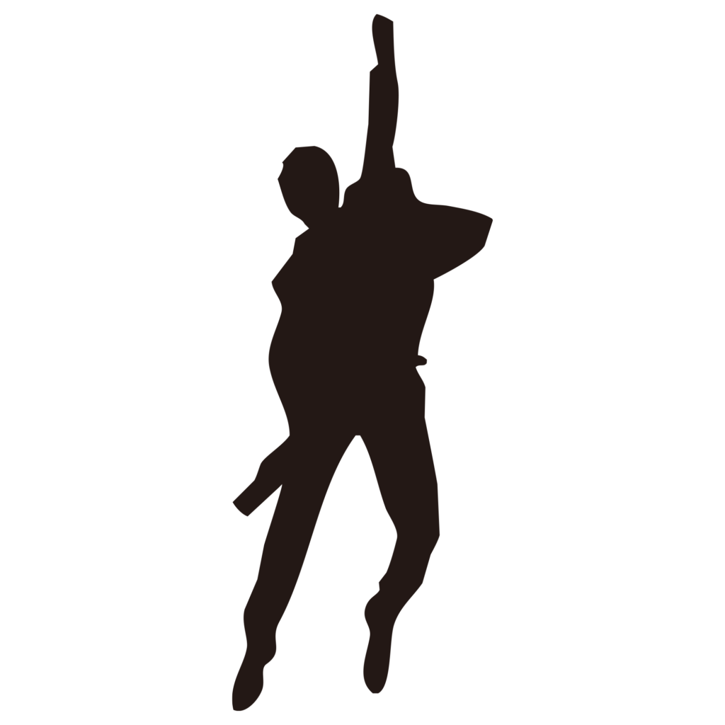 勢いよく空に向かってジャンプす