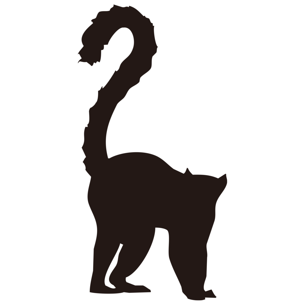 長い尻尾を高く上げた動物のシル