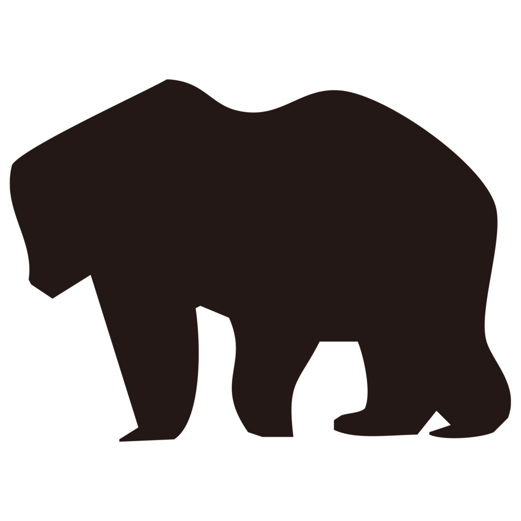 四足歩行するクマの力強いシルエ