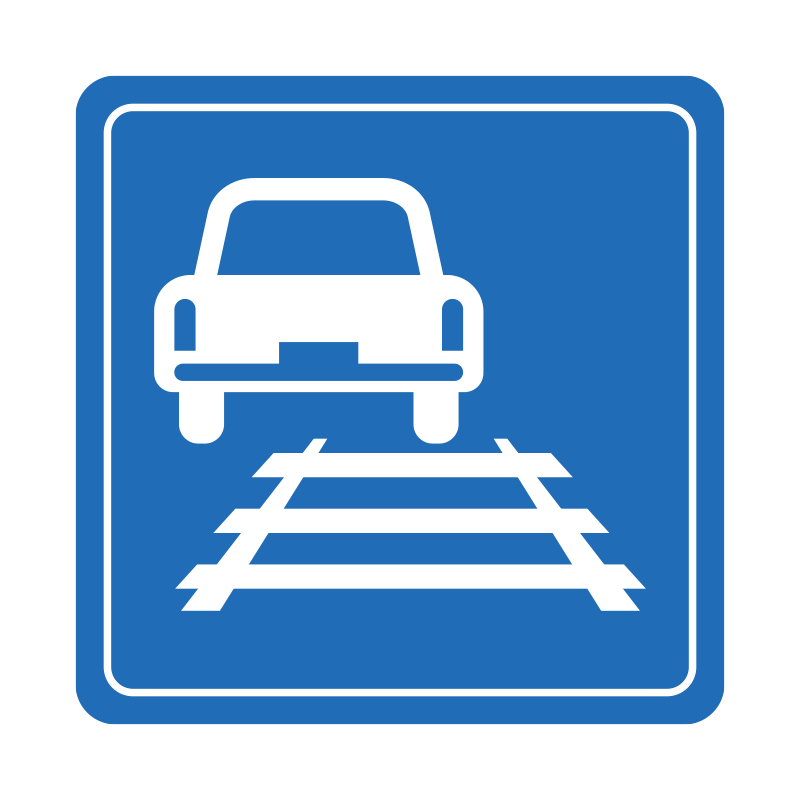 青い背景に、正面を向いた自動車