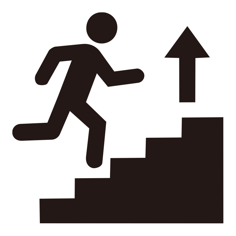 階段を力強く駆け上がっていく人