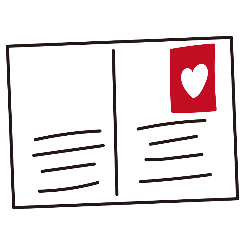 赤いハートの切手が貼られた、手