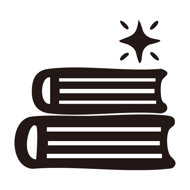 積み上げられた2冊の本の上に、