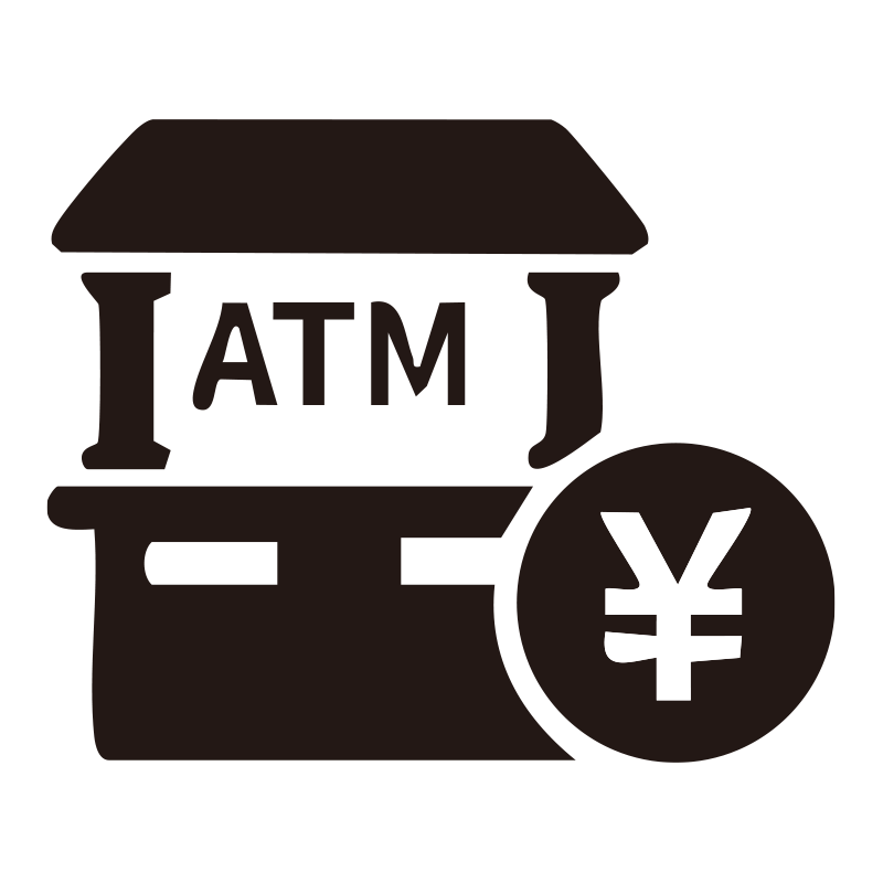 銀行の建物と「ATM」の文字、