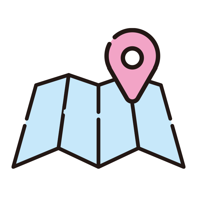 折りたたまれた地図の上にピンク