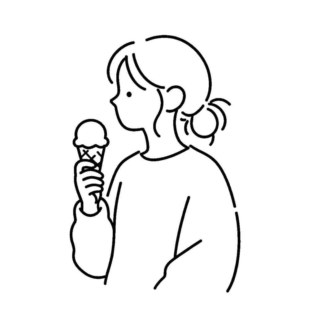 コーンアイスを持つ女性の横顔イ