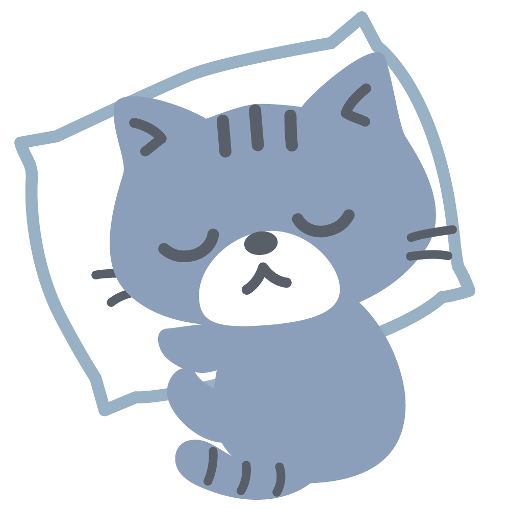 枕に頭をのせて寝ている灰色ねこ