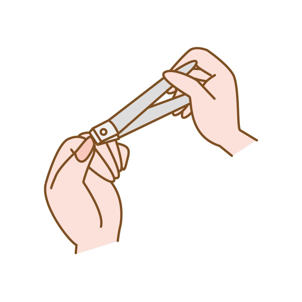 爪切りのイラストです。 手の親