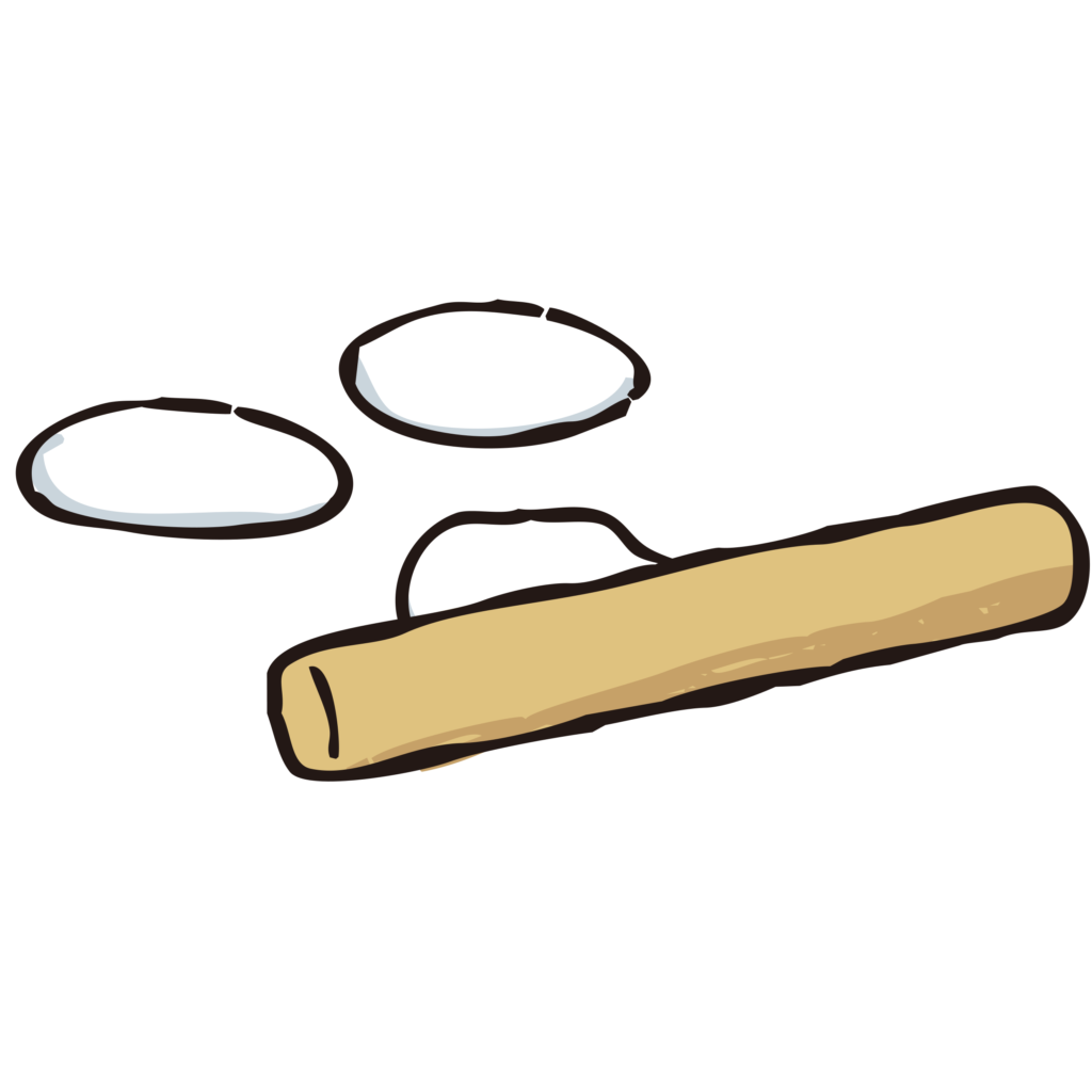 何かの生地を伸ばしているめん棒