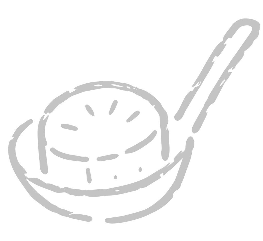 おたまにのせた、味のしみた大根